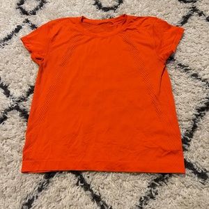 Lululemon Athletica Train To Be Tee, size 6, Orange